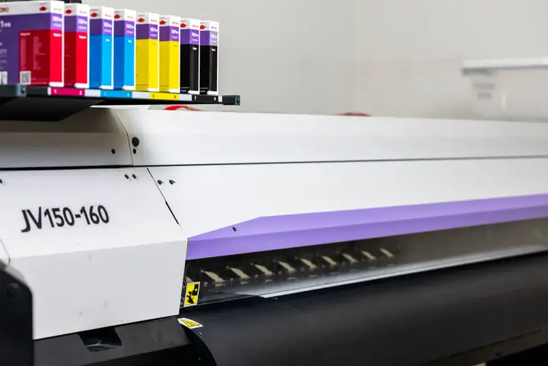 Wide-format printer in the Signs Limited print room