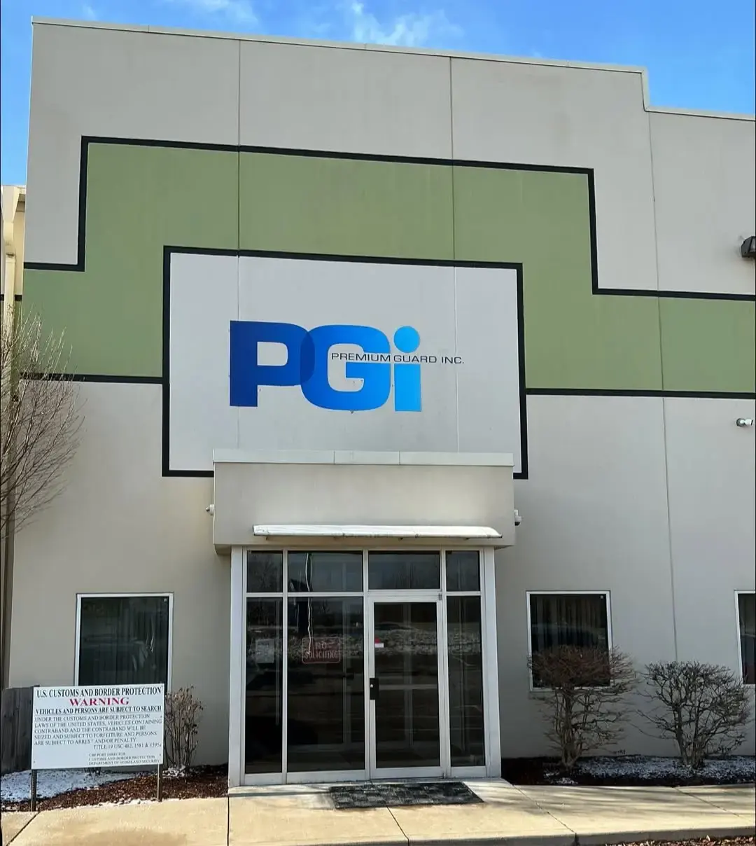 PGI building-mounted dimensional logo sign on a commercial facility