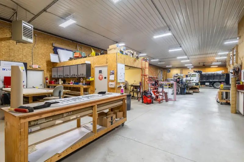 Sign assembly workbenches and tools in the Signs Limited shop